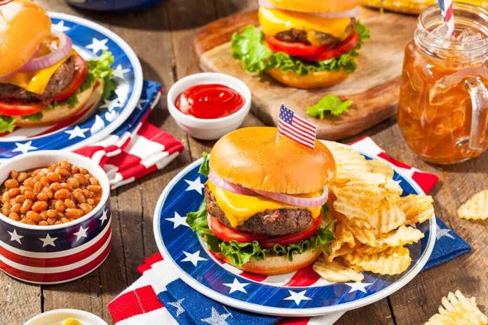 shutterstock_421470685 Cheeseburger with chips on a star-patterned plate