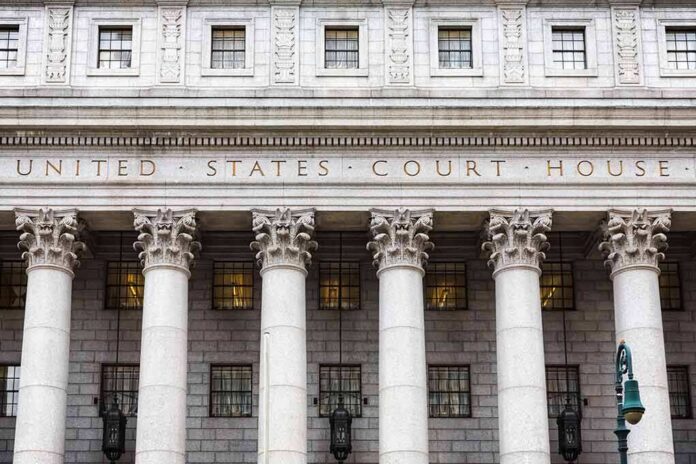 shutterstock_425197420-1 United States courthouse facade with Corinthian columns