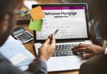 Laptop displaying refinance mortgage application form