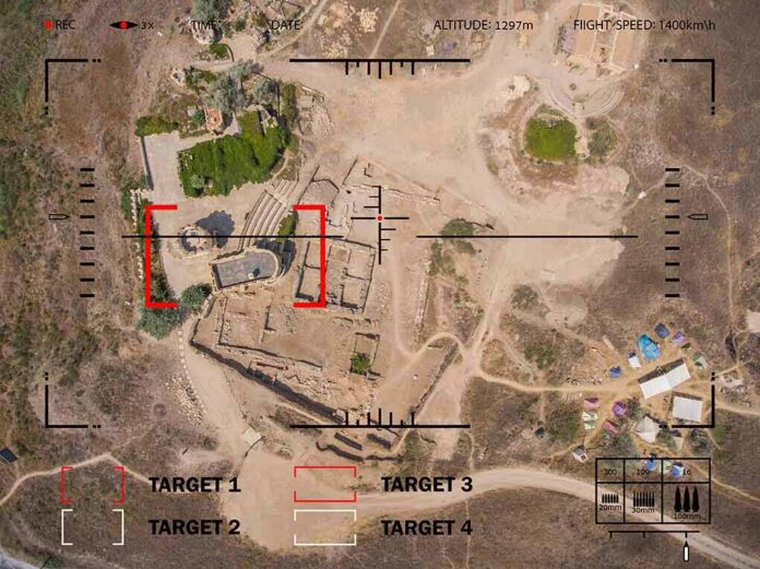 Aerial view through drone HUD of archaeological ruins and surrounding campsite
