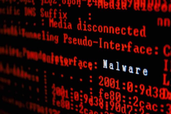 computer screen with red code highlighting malware