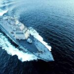 U.S. Struck Iran After Drone Hit a Cargo Ship — Iran Says It’s Not a Ceasefire Breach Naval warship cutting through open sea