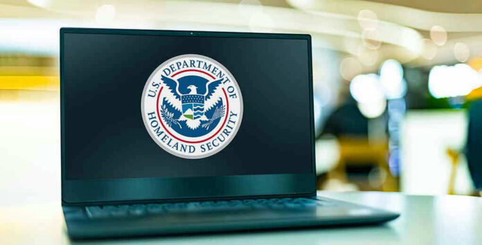 Laptop displaying U.S. Department of Homeland Security logo.