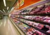 $42 Million Food Stamp Fraud Exposed Grocery store meat aisle stocked with packaged beef and poultry
