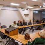 94-Year Senate Streak Suddenly in Jeopardy Roger Marshall addresses a community meeting with Apostolos Doxiadis among attendees