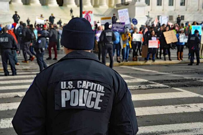 Police officer monitoring a protest on a city street