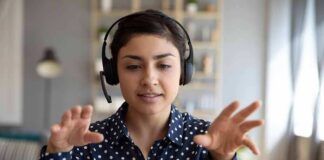 Woman wearing headset on video call