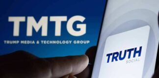 Smartphone showing Truth Social app icon beside TMTG logo on screen