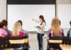Teacher Says Business Is Booming After Losing Job A teacher presenting to students in a classroom