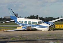 Family Survives Plane Crash in North Carolina Damaged blue and white small airplane on an airport runway