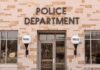 Police Chief Candidate Faces Child Rape Charges Police department building entrance with signage