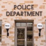 Police department building entrance with signage