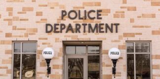 Police department building entrance with signage