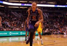 Brittney Griner driving to the basket during a basketball game