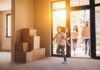Royal Family Relative Faces Child Abuse Material Probe Girl running into a sunlit empty room with moving boxes by the door